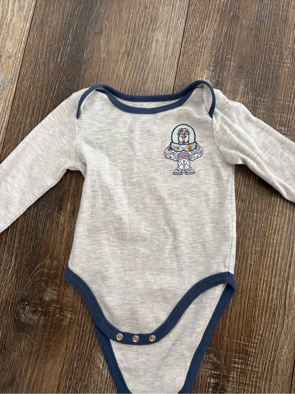 Disney Toy Storyb Baby One-Piece with Navy Trim buzz liueg